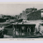 Antique postcard photo by Nadal -
Cholon, paddy depots on the docks of Mytho
